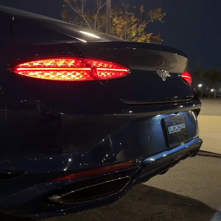 Bentley tail lights glowing at night